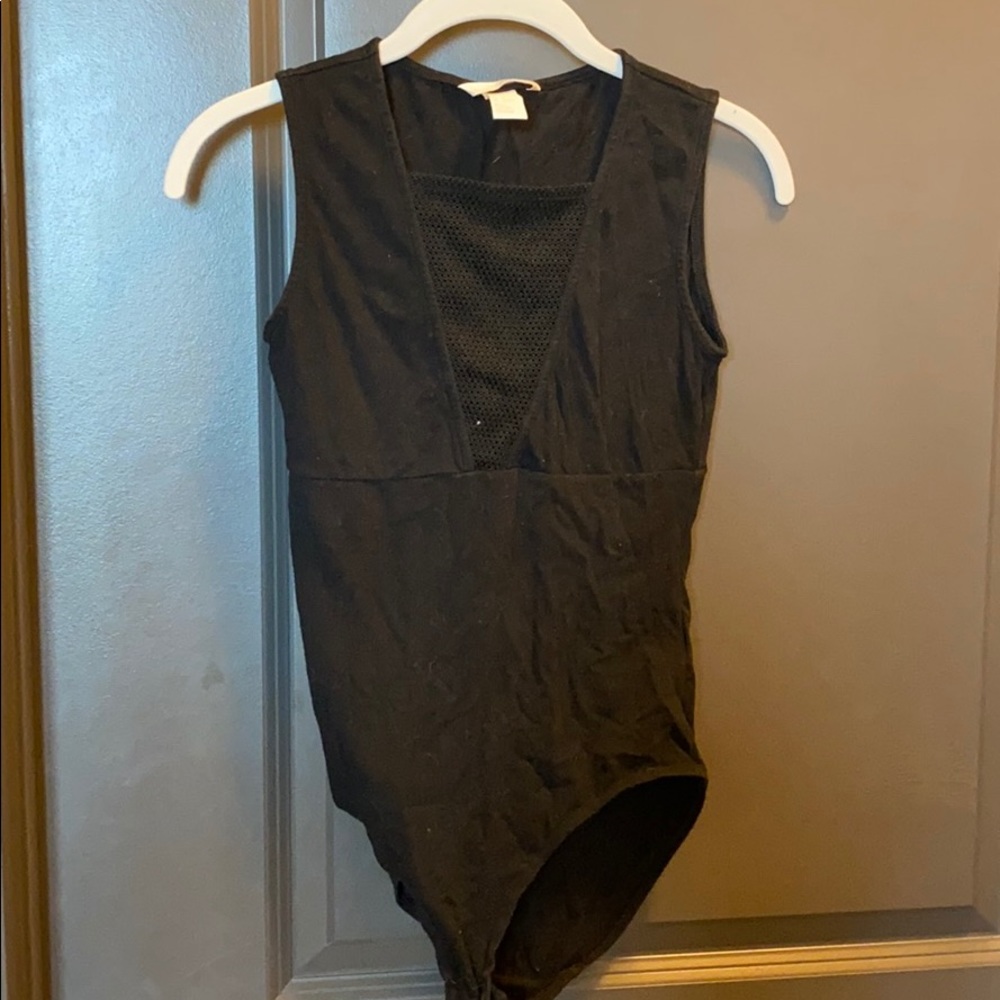 black bodysuit with mesh detail
